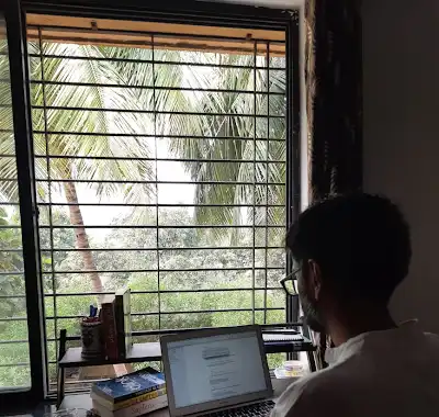 Tapan Patel working at his desk