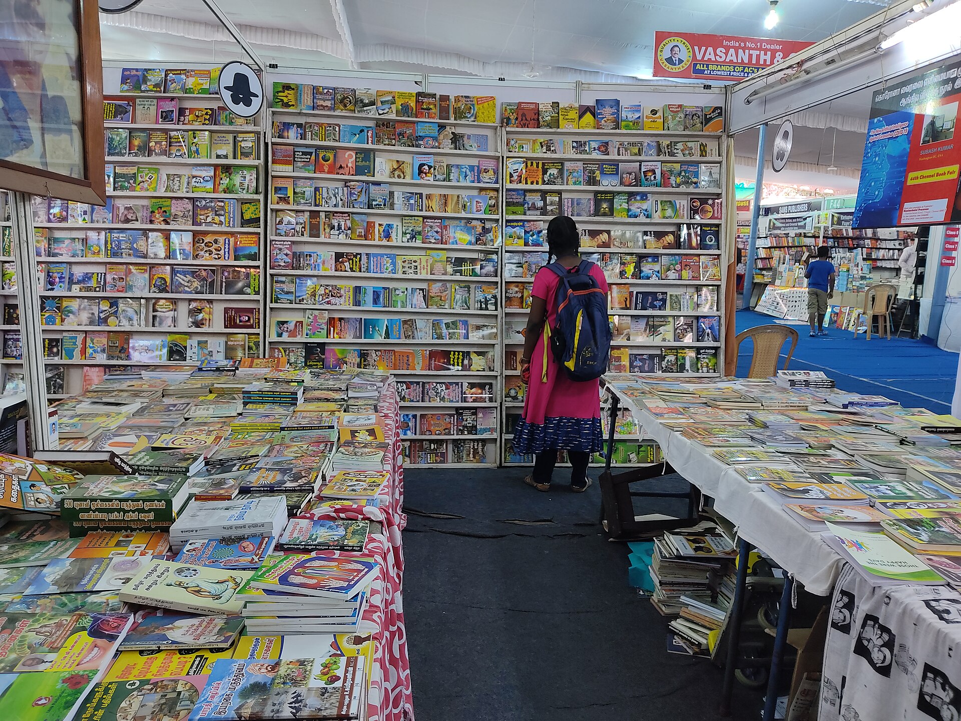 Colourful books arranged at a stall at the Chennai Book Fair